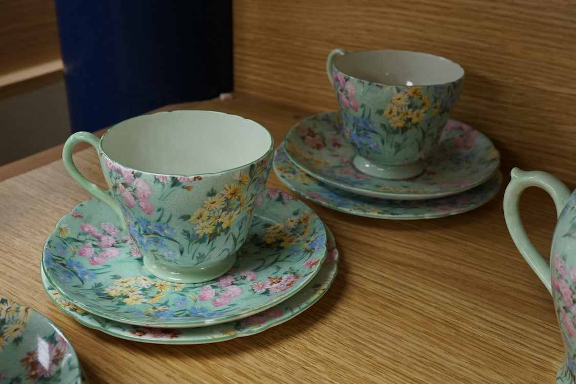 A Shelley ‘Melody’ porcelain six cup tea set, teapot missing, cake plate 25cm square (21)